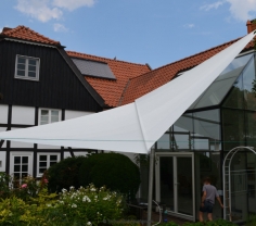 Hovestadt  Sonnensegel über Terrasse und Wintergarten